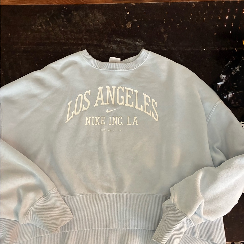 Nike Women's Sky Blue Oversized Crewneck Cropped Sweater